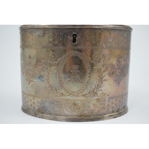 21 - A George III silver oval tea caddy by Hester Bateman, with engraved decoration and armorial and turn... 