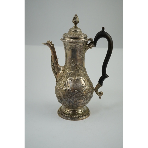 23 - A George III silver coffee pot, by Aldridge & Green, with later embossed decoration, of baluster for... 