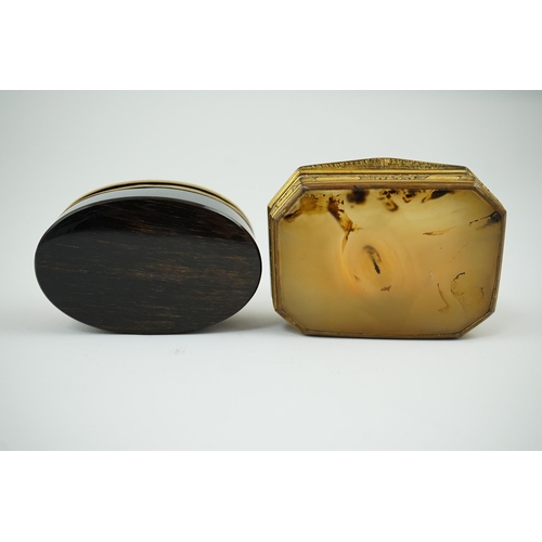 27 - An early 19th century German gold mounted rutile agate? oval snuff box, 64mm and another gilt copper... 