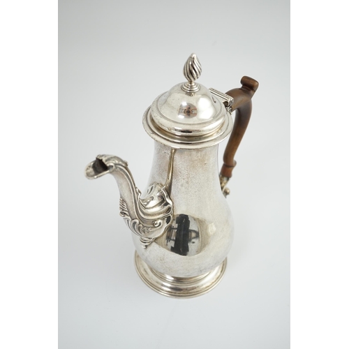 29 - An early George III silver coffee pot, by Gurney & Cook, of baluster form, London, 1761, height 27.5... 