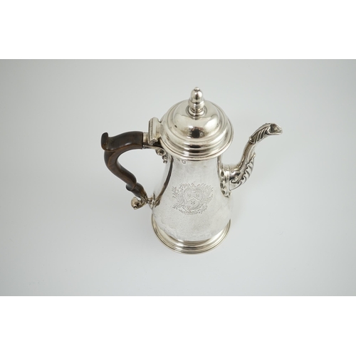 3 - A George II silver coffee pot, by Thomas Whipham, of baluster form, with engraved armorial and monog... 