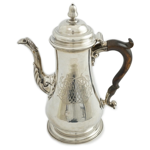 3 - A George II silver coffee pot, by Thomas Whipham, of baluster form, with engraved armorial and monog... 