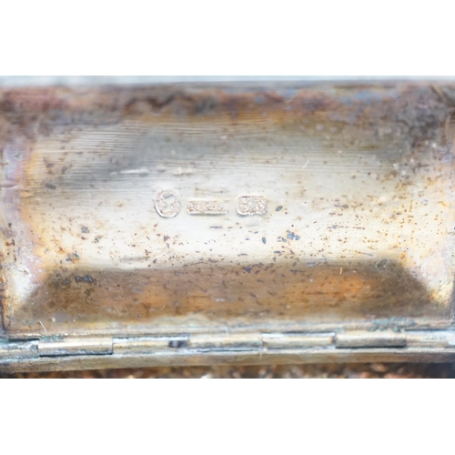 33 - An early Victorian silver rectangular snuff box, by Neustadt & Barnett, Birmingham, 1840, 69mm, toge... 