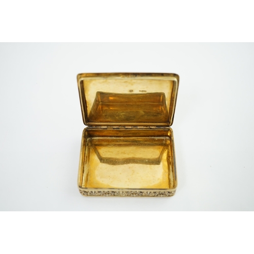 35 - A George III silver gilt rectangular snuff box, by William Parker, embossed with figures amongst fol... 