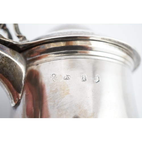 4 - A George II silver tankard, indistinct maker's mark, with banded girdle, hinged domed cover and open... 