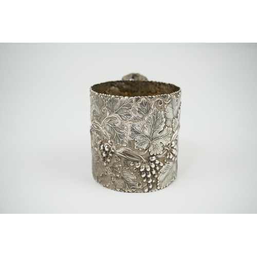 45 - A William IV silver christening can, by Joseph Wilmore, with continuous fruiting vine decoration and... 