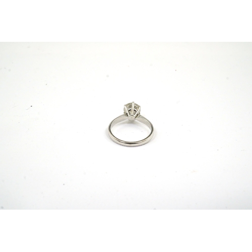 478 - A modern 18ct white gold and solitaire diamond set ring, the stone of cloudy appearance, with a diam... 