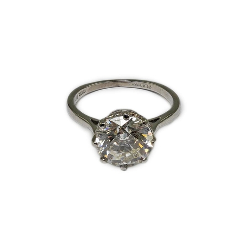 480 - A platinum and solitaire diamond set ring, the round cut stone weighing approximately 2.40ct, with a... 