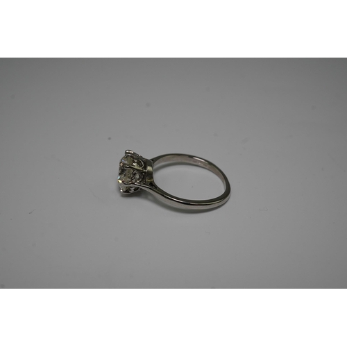 480 - A platinum and solitaire diamond set ring, the round cut stone weighing approximately 2.40ct, with a... 