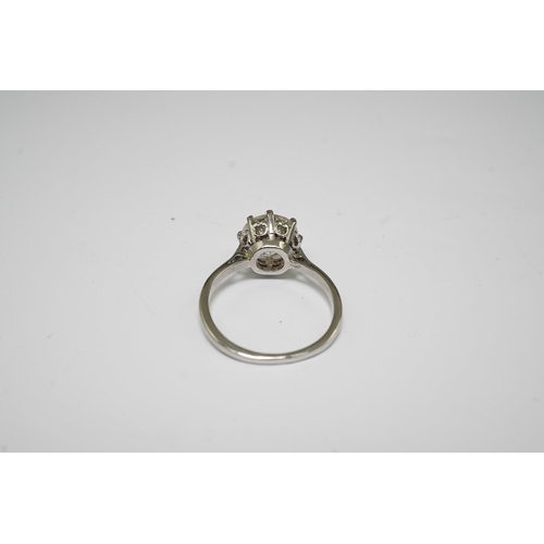 480 - A platinum and solitaire diamond set ring, the round cut stone weighing approximately 2.40ct, with a... 