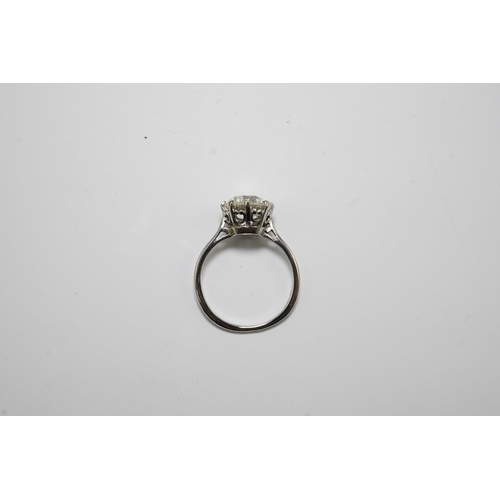 480 - A platinum and solitaire diamond set ring, the round cut stone weighing approximately 2.40ct, with a... 