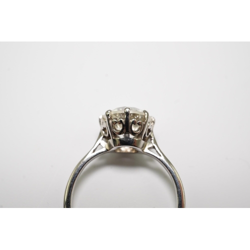 480 - A platinum and solitaire diamond set ring, the round cut stone weighing approximately 2.40ct, with a... 