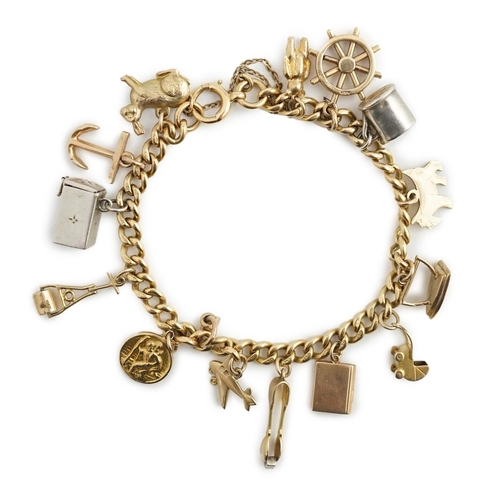 482 - A 18ct gold charm bracelet, hung with fourteen assorted 9ct gold or silver charms, including a pram,... 