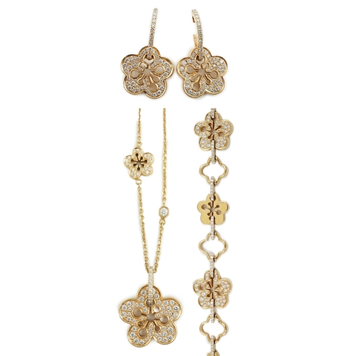 483 - A modern suite of Boodles & Dunthorne 18ct rose gold and diamond chip set jewellery, of flower head ... 