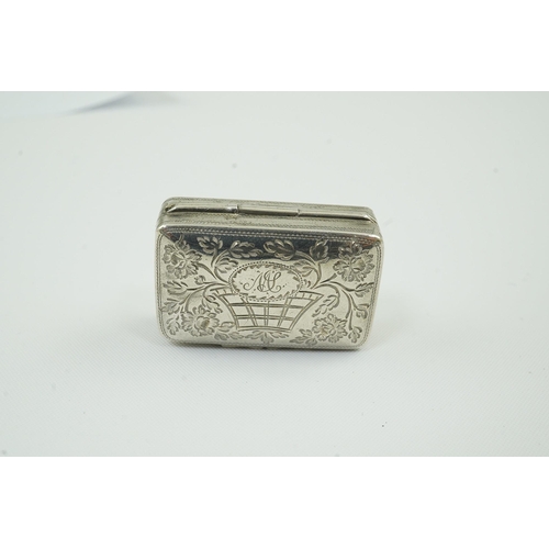 56 - An early George IV silver rectangular vinaigrette, by Simpson & Son, decorated with a basket of foli... 