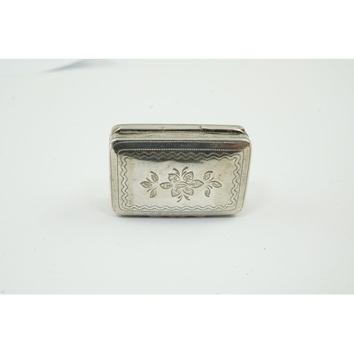 56 - An early George IV silver rectangular vinaigrette, by Simpson & Son, decorated with a basket of foli... 