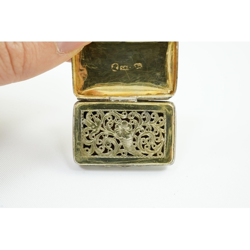 56 - An early George IV silver rectangular vinaigrette, by Simpson & Son, decorated with a basket of foli... 