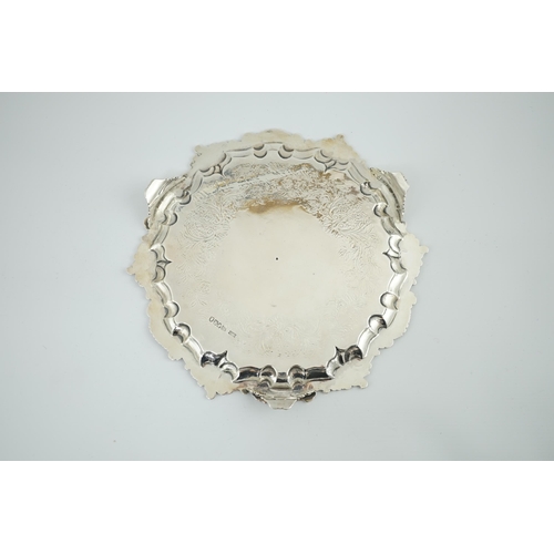 60 - A George IV silver salver, by William Bateman, of shaped circular form, with scroll and foliate bord... 