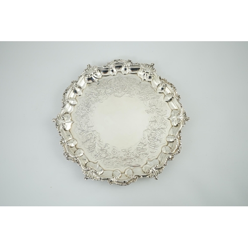 60 - A George IV silver salver, by William Bateman, of shaped circular form, with scroll and foliate bord... 