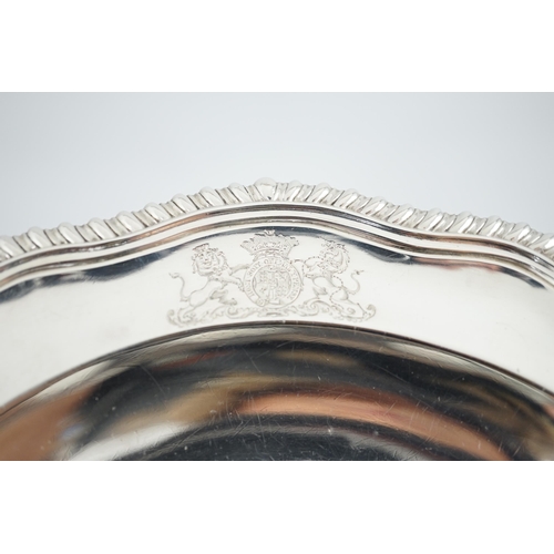 61 - A George IV silver soup plate, by William Eaton, of shaped circular form, with engraved initials and... 