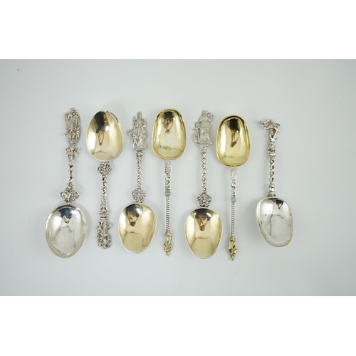 63 - Eight assorted late 19th century continental silver historismus apostle spoons, two with gilded fini... 