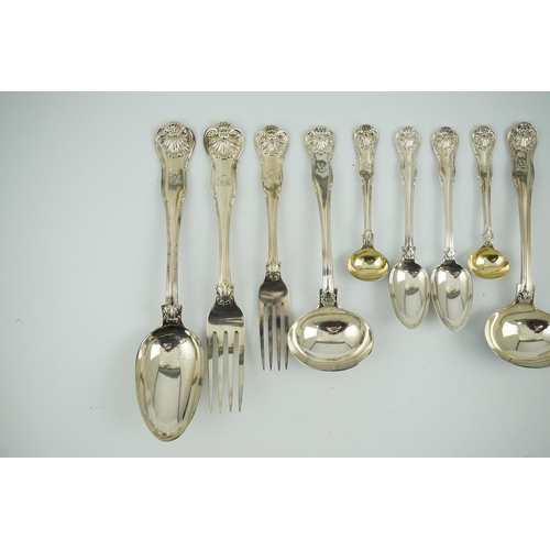 66 - A matched part canteen of George IV and later silver shell scroll pattern flatware, comprising four ... 