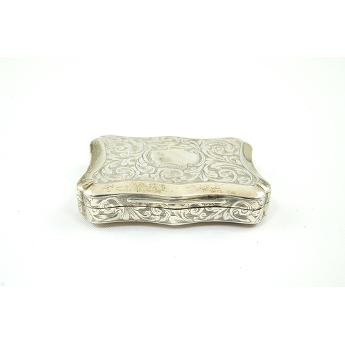 67 - An early Victorian engraved silver vinaigrette, by William Simpson, of shaped rectangular form and d... 