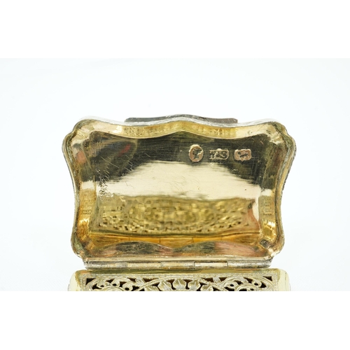 67 - An early Victorian engraved silver vinaigrette, by William Simpson, of shaped rectangular form and d... 