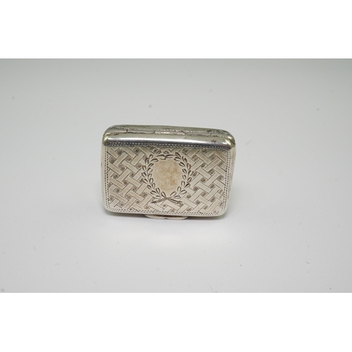 69 - An early Victorian silver rectangular vinaigrette, by George Unite, engraved with basket weave decor... 