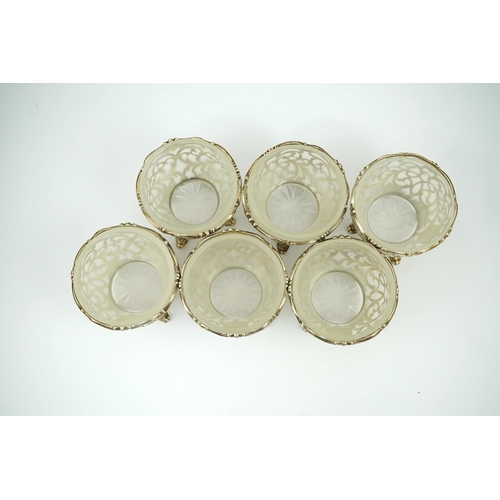 78 - A set a six Victorian pierced silver circular sorbet dishes, with frosted glass liners, Edward & Joh... 