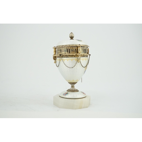 87 - A 19th century Swiss miniature silver and guilloche enamel urn shaped timepiece, with painted panels... 