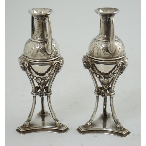 93 - A pair of Victorian silver miniature urns on stands, by William & John Barnard, with engraved decora... 