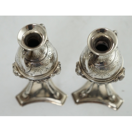 93 - A pair of Victorian silver miniature urns on stands, by William & John Barnard, with engraved decora... 