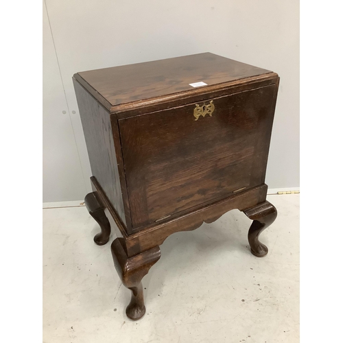 1010 - An early 20th century George II style oak record cabinet on cabriole legs, width 59cm, depth 45cm, h... 