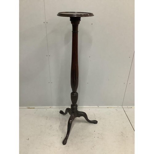 1018 - A George III style mahogany torchere, height 148cm. Condition - fair