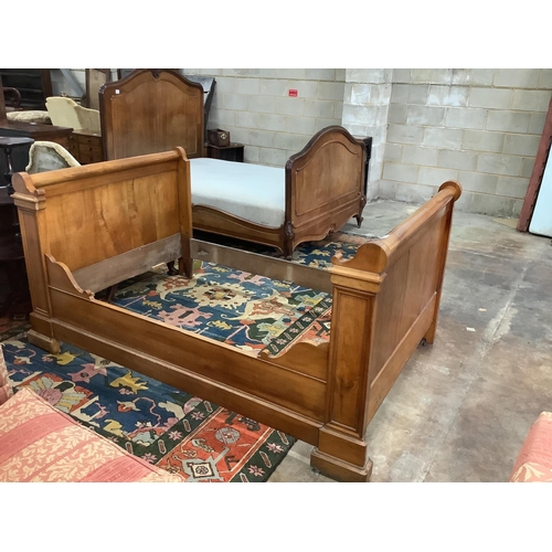 1031 - A 19th century French carved walnut sleigh bed, width 130cm, length 202cm, height 100cm. Condition -... 