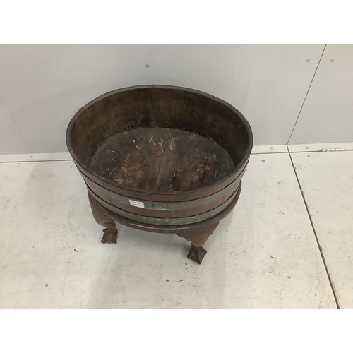 1049 - A George III oval brass bound mahogany wine cooler, width 54cm, depth 42cm, height 49cm. Condition -... 