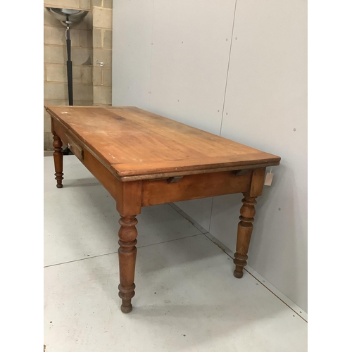 1050 - A 19th century French draw leaf kitchen table, width 200cm, depth 84cm, height 76cm. Condition - fai... 