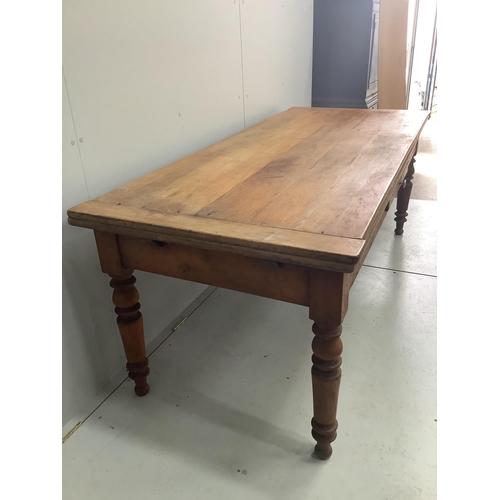 1050 - A 19th century French draw leaf kitchen table, width 200cm, depth 84cm, height 76cm. Condition - fai... 