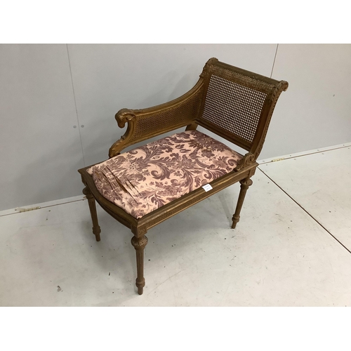 1061 - A Louis XVI style painted and giltwood caned seat, width 75cm, depth 44cm, height 84cm. Condition - ... 