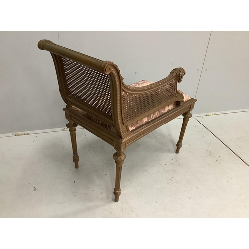 1061 - A Louis XVI style painted and giltwood caned seat, width 75cm, depth 44cm, height 84cm. Condition - ... 