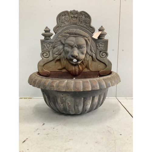 1110 - A cast iron lion mask wall fountain, width 68cm, height 74cm. Condition - fair