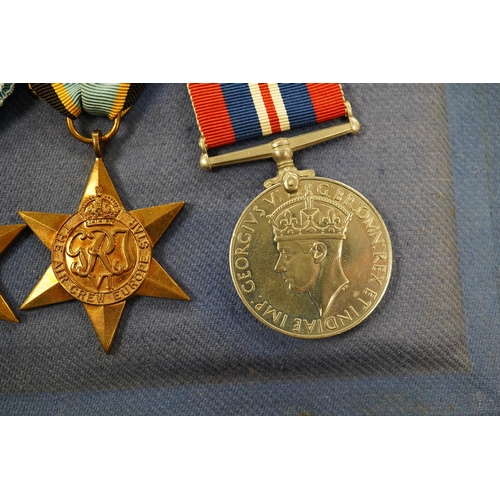 2177 - A DFC medal group with an Air Crew Europe star in a display case. Condition - good