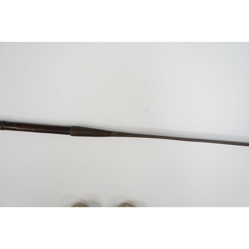 2207 - An African spear, with elongated iron tip and short hardwood shaft, 185cm. Condition fair to good, w... 