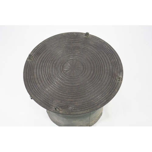 2209 - A Shan States bronze rain drum, the concentric ring decorated top mounted with stylised frogs, sides... 