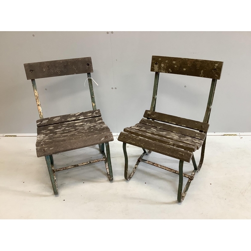 100 - A pair of vintage slatted wrought iron garden chairs, width 45cm, depth 45cm, height 76cm. Condition... 