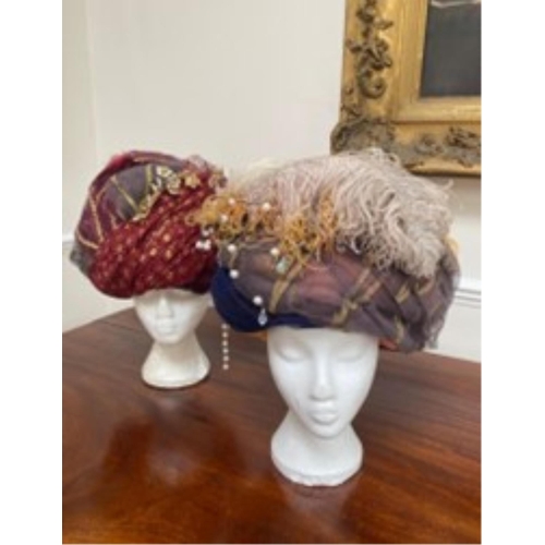 156 - Two elaborate turbans, labelled Royal Opera House Lucrezia Borgia', and two modern Indian turban ha... 
