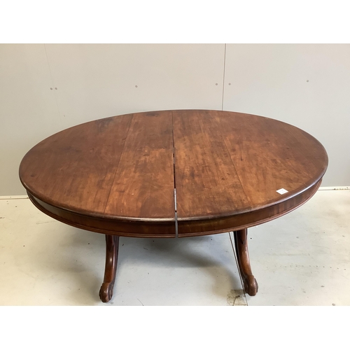 77 - A Victorian mahogany twin pillar extending dining table, 246cm extended, two spare leaves, depth 134... 