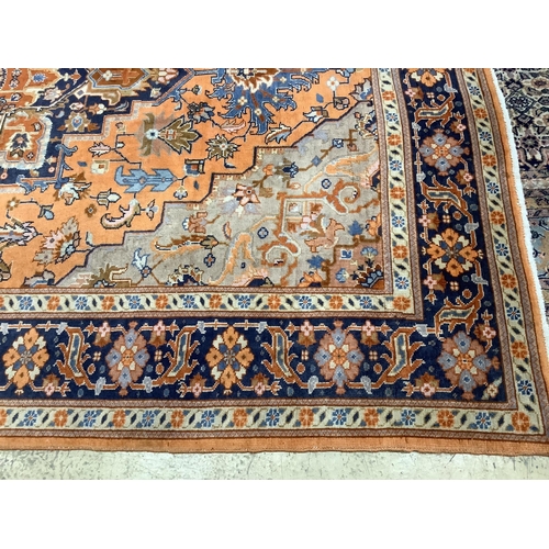 99 - A North West Persian peach ground carpet, 270 x 204cm. Condition - fair