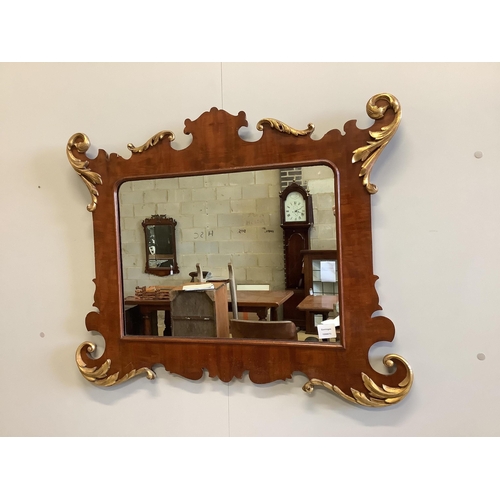 1007 - A George II style parcel gilt mahogany fret cut wall mirror, width 89cm, height 70cm. Condition - fa... 